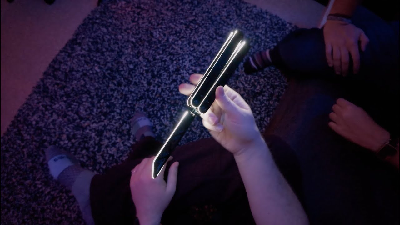 Load video: Hosts unbox and review a Flyscape product, highlighting its large size, innovative design, and unique charging method. They compare it to standard items and share insights on user instructions and tuning challenges.