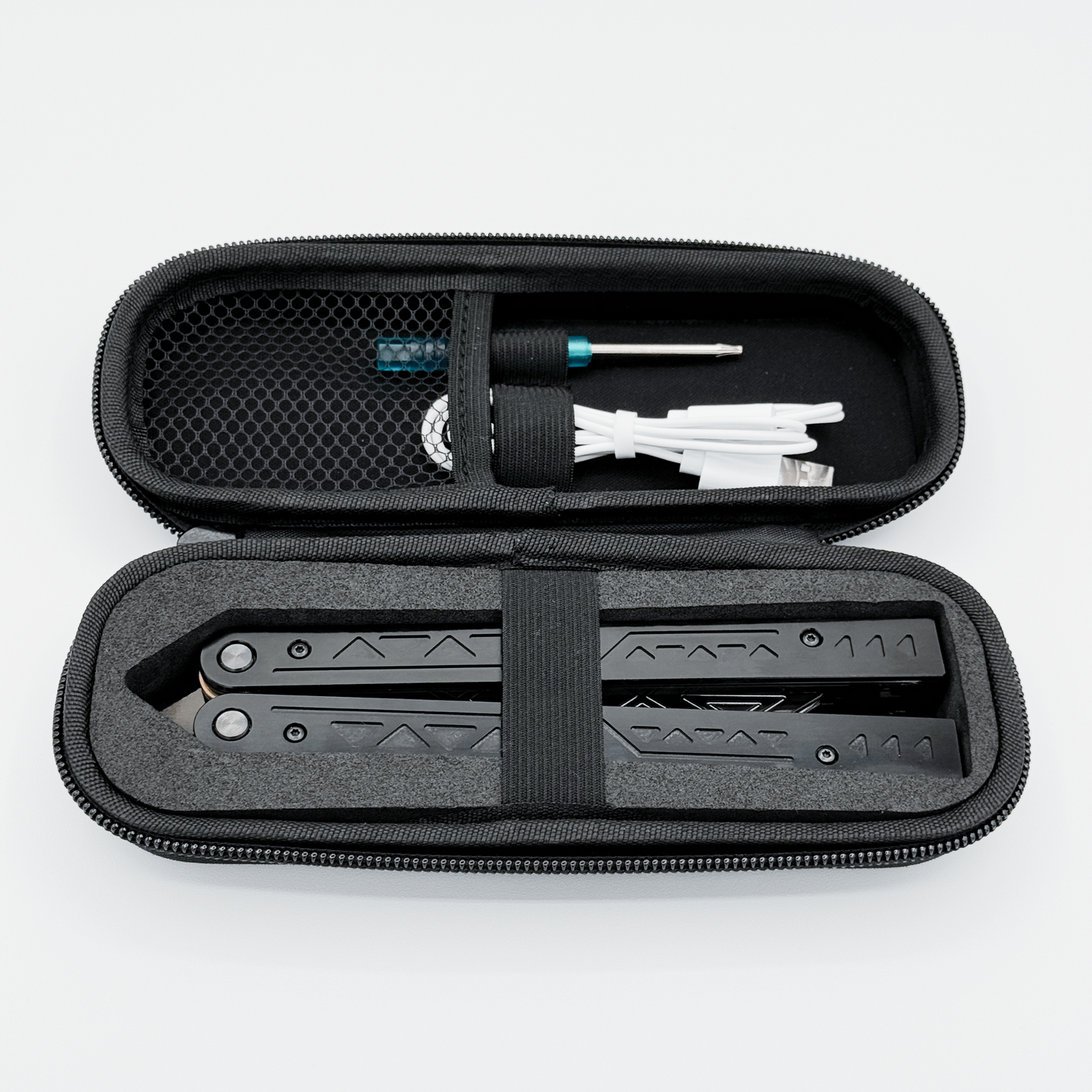 The EOS light-up butterfly trainer in its carrying case, including charging cable and screwdriver.