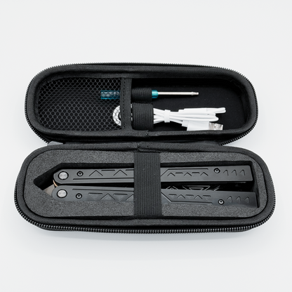 The EOS light-up butterfly trainer in its carrying case, including charging cable and screwdriver.