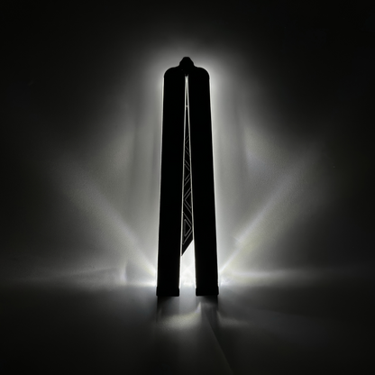 Closed EOS light-up butterfly trainer with glowing fiber optic cables embedded in a sleek Aluminum 7075 body, showcasing a modern design and a luminous outline for enhanced visibility in low light.